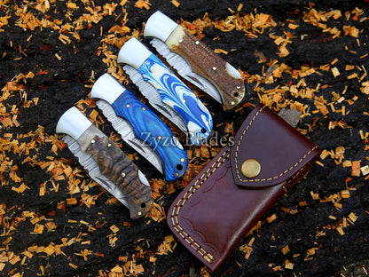 damascus-pocket-folding-knife-ram-horn-zyzo-blades