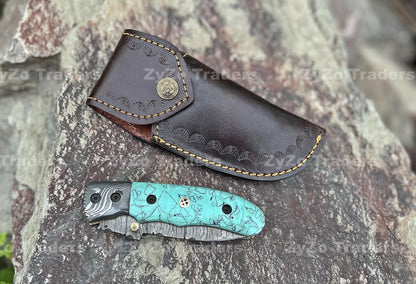 Handmade Damascus Folding Knife: Turquoise Resin Handle, Leather Sheath
